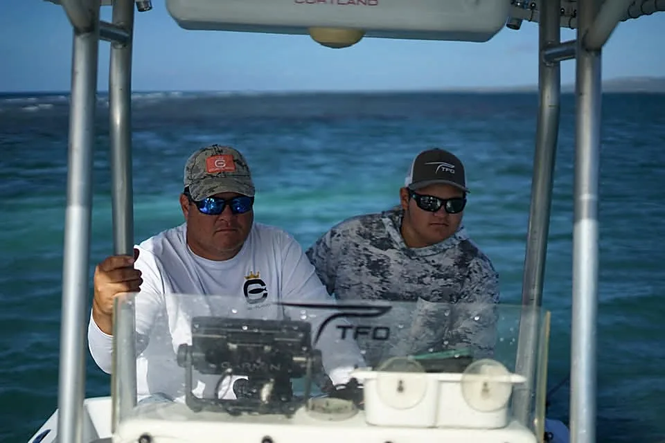 Captain and crew operating the boat in Puerto Rico coastal waters.