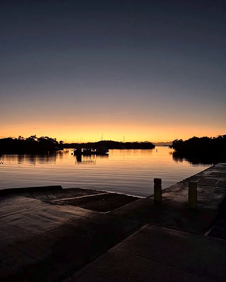 Quiet marina and mangrove shoreline at sunset near Cabo Rojo, Puerto Rico.