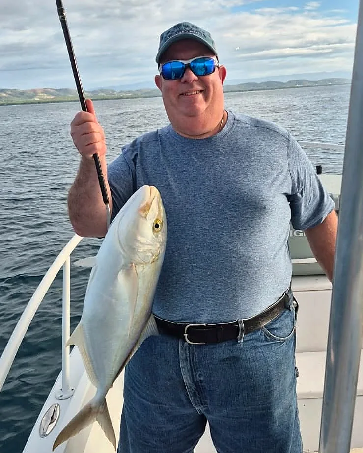 Guest displaying an inshore fish aboard a Puerto Rico charter boat.